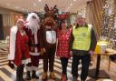 Santa, Rudolph and some of their Rotary helpers (Sharon Webster, Tracey Phillips and Chris Smith)