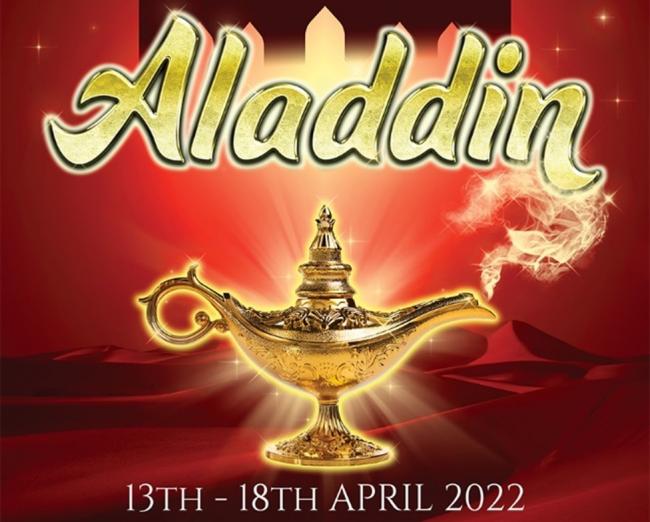 A promotional poster for 'Aladdin'