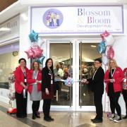 The ribbon-cutting of the new Blossom & Bloom development hub