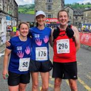 The Prestatyn trio of Mandy Cartwright, Sophie Johnson and James Rogers, clearly pleased with their performances in the tough Ras y Gader on Saturday.