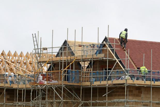 New houses being constructed. Photo credit: Gareth Fuller/PA Wire.