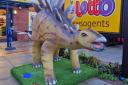 Dinosaur outside Denmore Premier Food Store in Rhyl
