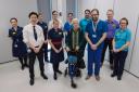 Mary Gallacher (centre) and members of the ERP, including Orthopaedic Consultant Mr Edmond U (front left); Rebecca Warren, Enhanced Recovery Lead (front second on the left); and Orthopaedic
