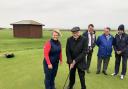 Ladies' European Tour player Lydia Hall gives Lord Dafydd Elis Thomas a putting lesson