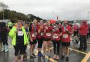 Soaked but happy - the Prestatyn Running Club members after completing the Porth Eirias 10k in Colwyn Bay