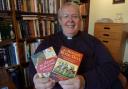 Bishop of St Asaph, Gregory Cameron, with his books