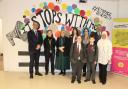 The PCC with Prestatyn High School teaching staff and students in front of the diversity mural