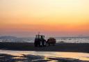 Sebastian Treloar took these photos of sunset while Rhyl lifeboat crew members carried out drills on the beach.