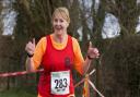 Though it was her first cross-country race Lesley Furneaux clearly enjoyed the mudbath.