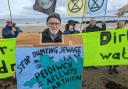 Campaigners pictures on Rhosneigr beach last year. (ImageNorth West Wales Climate Action Group)