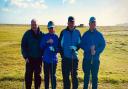 Some of Rhyl Golf Club's longstanding members about to tee off on a sunny but windy re-opening day