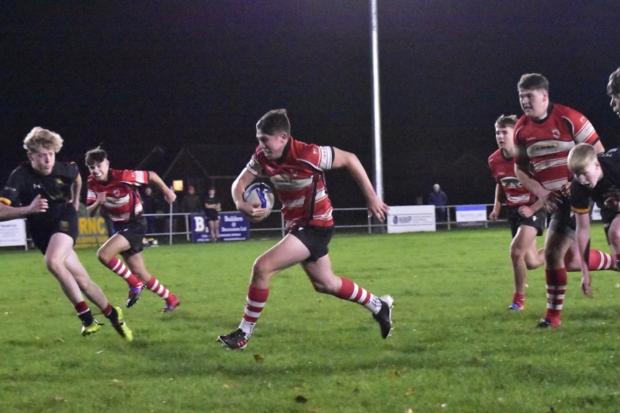 Tom Jones breaks through to touch down under the posts. Picture: Paul Brookes
