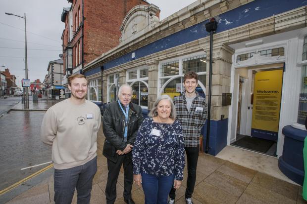 Rhyl Journal: (L/R) Owain Colwell (Community Manager at Costigan's), Cllr Hugh Evans (Leader of Denbighshire County Council), Mandy Weston (Founder and COO of TownSq) & Carl Turner (Senior Community Manager for TownSq). Picture: Paperclip Public & Media Relations