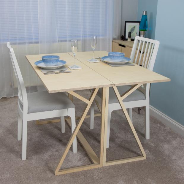 Rhyl Journal: A bespoke folding dining table which also works as a home office desk, designed specifically for an individual customer. Photo: Bobbi Barnwell