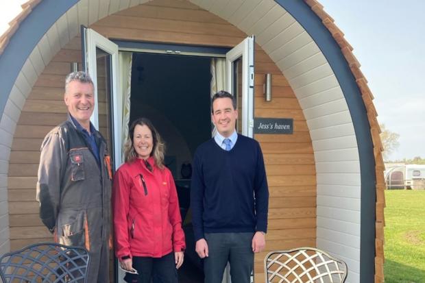 Vale of Clwyd MP Dr James Davies with Celia and Rob Williams at Abbey Farm Caravan and Camping Park in Rhuddlan.