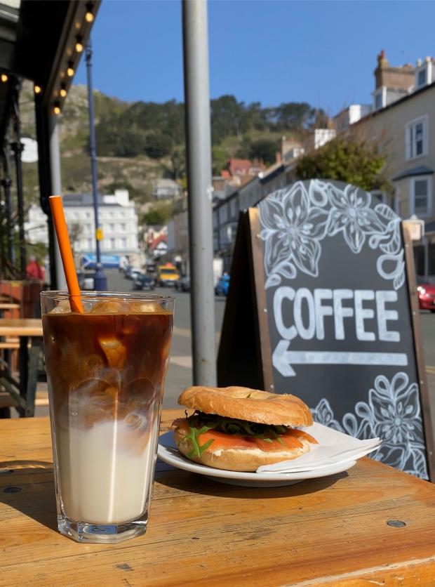 Rhyl Journal: An iced latte and a bagel from Providero. Photo: Harry Ormerod
