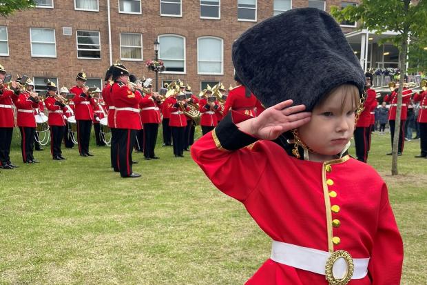 Little Owen Watson from Ruabon leading the Royal Welsh Fusiliers. Picture by Gill McGowan.