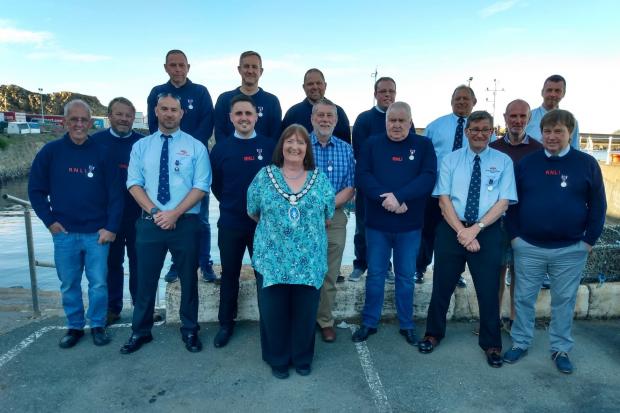 Fishguard and Goodwick Mayor presented the town's lifeboat crew and voluteers with their Platinum Jubilee medals. Picture: Western Telegraph