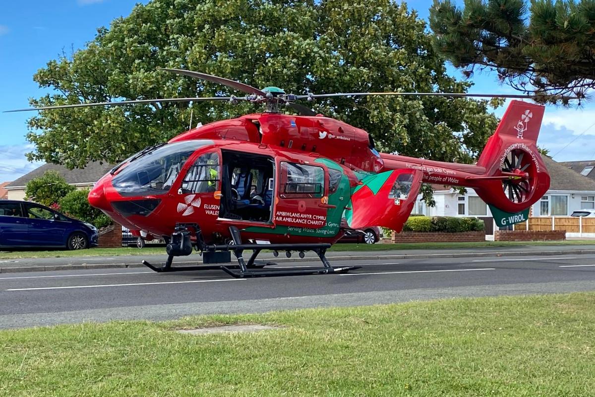 A Wales Air Ambulance at the scene of the incident on the coast road. Photo: Sophie Jones