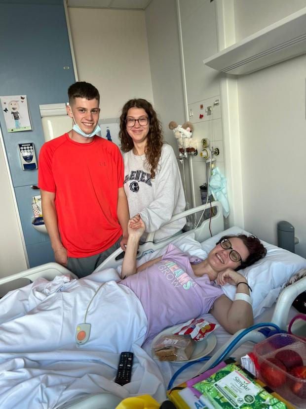 Rhyl Journal: Vania in hospital with two of her children, Daisy and Rowan. Photo: Stu Tong