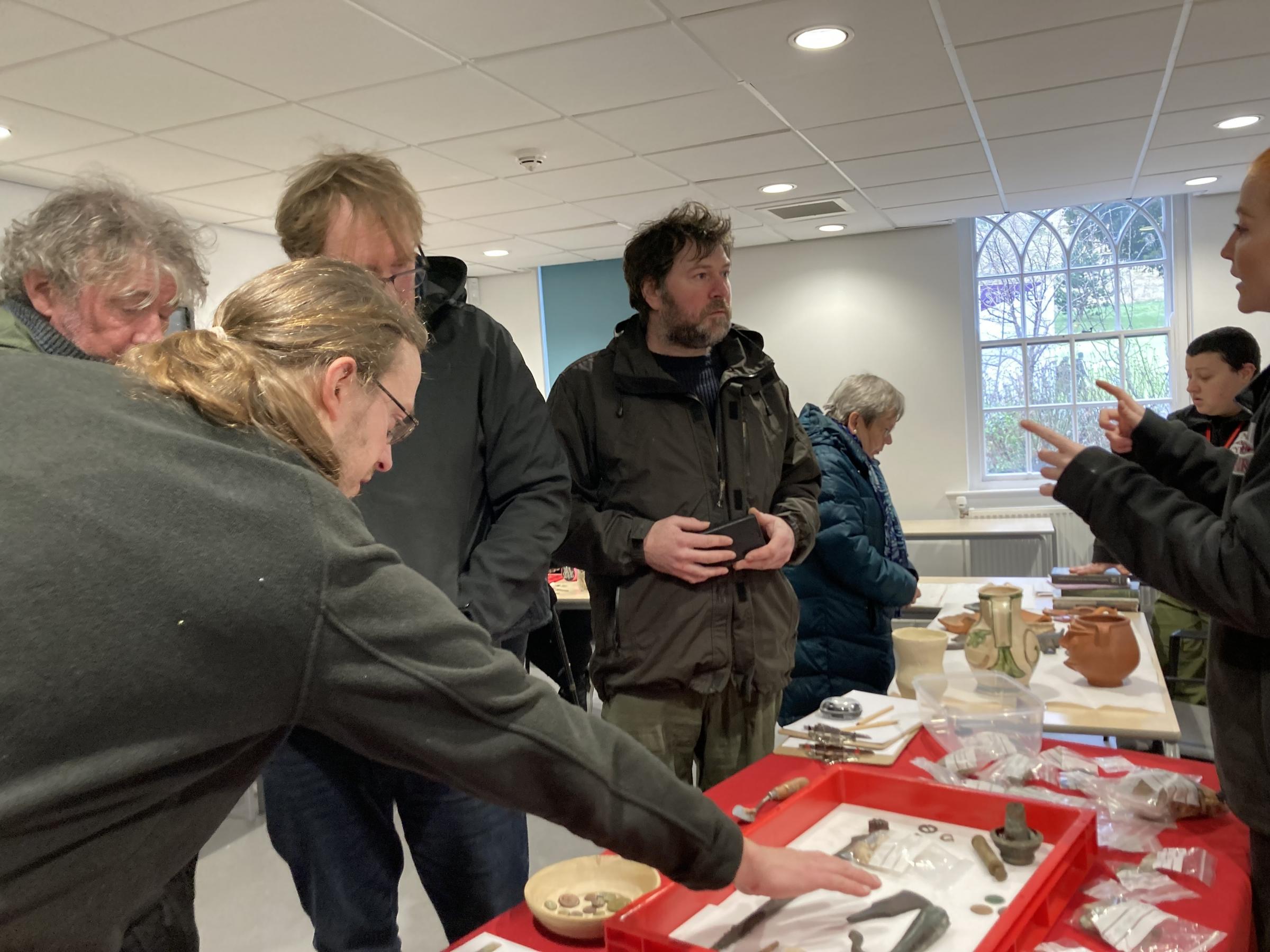 Dr David Howell and Pas Cymru representatives talk to the public about the finds at Bangor\s Storiel museum pop-up event Image Dale Spridgeon