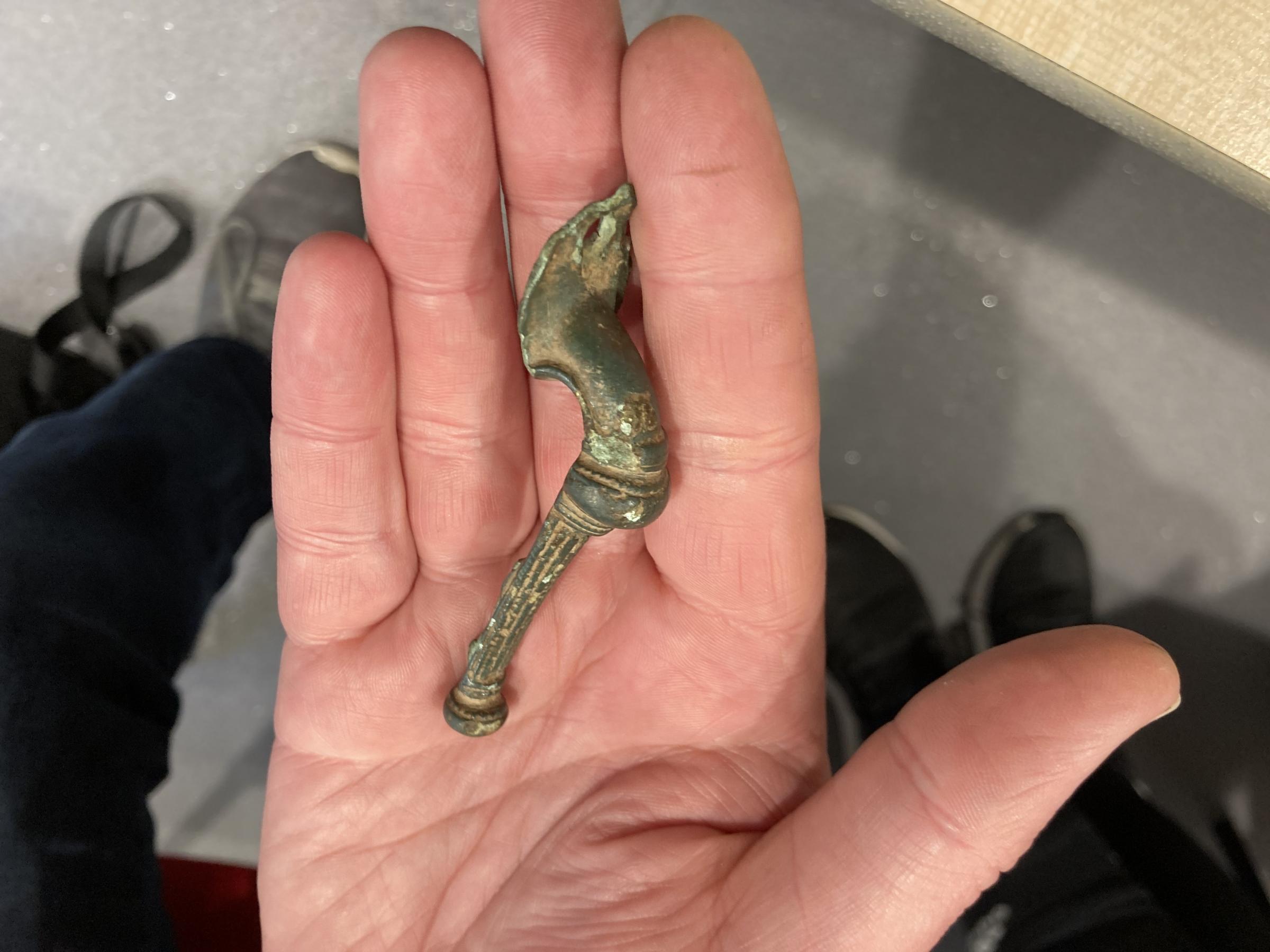 Steffan Coupe shows the Roman Fibula brooch he found on Anglesey (Image Dale Spridgeon)