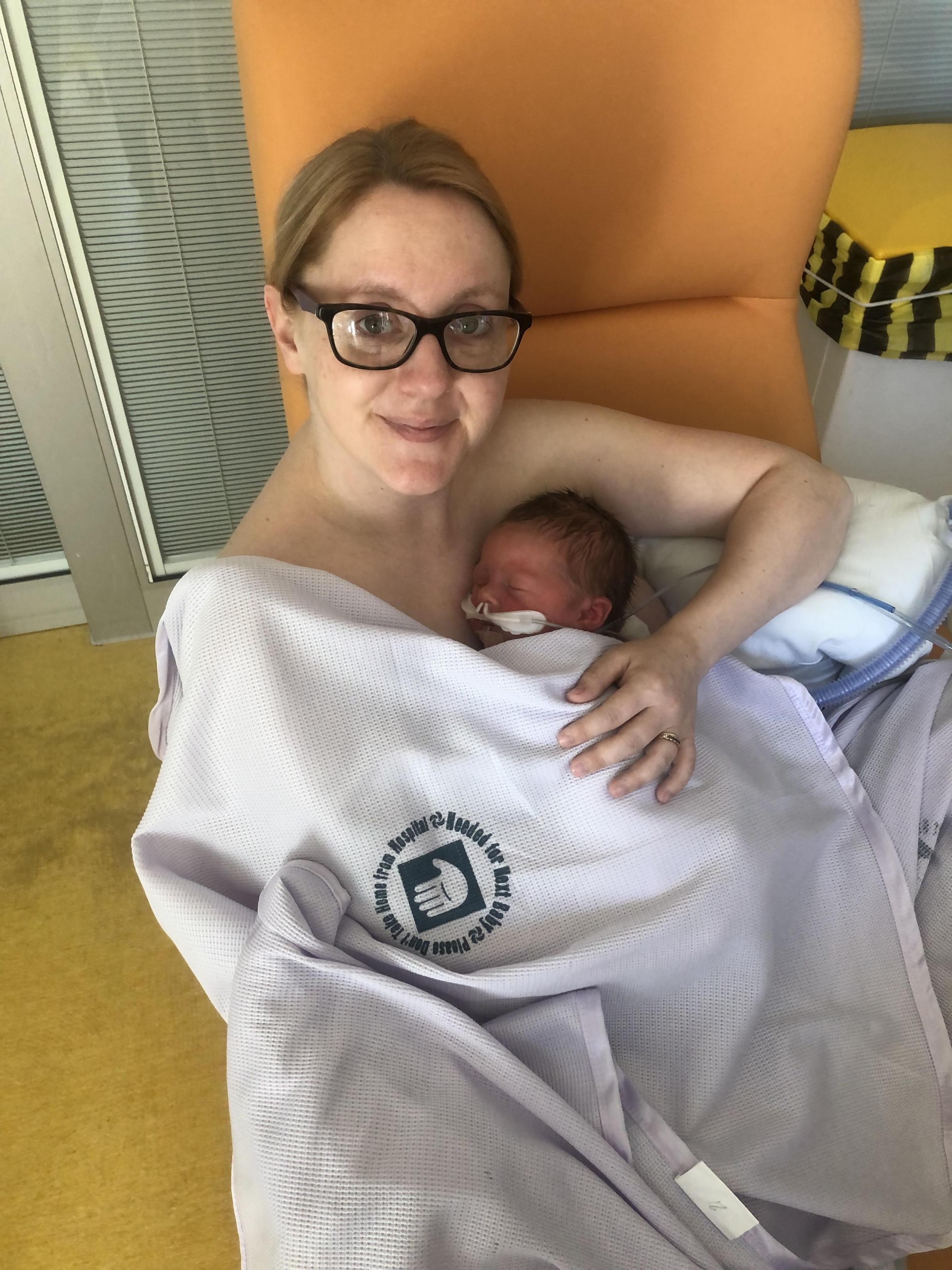 Jade Baker with newborn James.