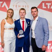 Jonathan Dawes (centre) with his 'Young Person of the Year' gong at the Lawn Tennis Association's awards