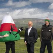 Mario Kreft (Centre) with from left, Sian Eirian with Mr Urdd  and Bryan Jones Cledwyn Jones who masterminded the project.