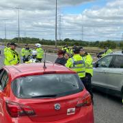 Former HGV driver from Cwmbran, Vicky Stamper, is arrested during the M4 protest over fuel prices for driving too slowly.  Picture: Bronwen Weatherby/PA Wire