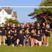 The Abergele Ladies Rugby team with their trophy.