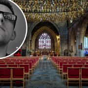 Chris Woodbine with his photo of the inside of St Asaph's cathedral.