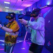 People enjoying one of the new VR games at Knightly's Amusements