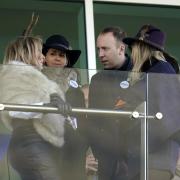 Carol Vorderman, Gina Coladangelo and Matt Hancock in the stands during the Close Brothers Mares' Hurdle on day one of the Cheltenham Festival at Cheltenham Racecourse.