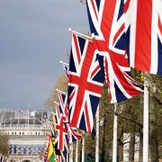 Union flags hang from the street furniture outside Buckingham Palace on the Mall, London, ahead of the coronation of King Charles III on Saturday May 6. Picture: PA