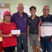 Rhuddlan Bowling Club's Annual Open Mixed Triples Competition winners Louise Dougal, Jack Dougal and Shaun Williams.