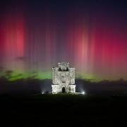 Aurora over Paxton's Tower in Carmarthen, Wales, September 25, 2023.