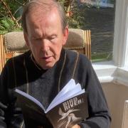 John Davies with his latest book, “Bird River”