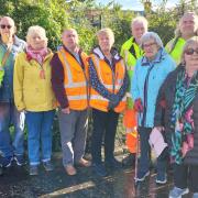 Friends of Prestatyn Railway Station and members of Denbighshire County Council's Streetscene team