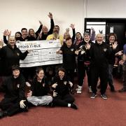Work in Progress receives the £1,000 cheque.