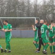 Rhyl celebrate their 5-0 win at Saltney Town