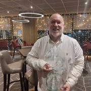 Richard Kendrick with his two prizes at the Rhyl BID Business Awards