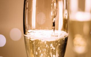 Sparkling wine being poured into a glass. Credit: Canva