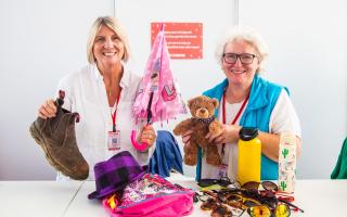 Volunteers Catherine Jones (left) and Catherine Hughes have been kept busy throughout the Eisteddfod at Boduan. Photo: Iolo Penri