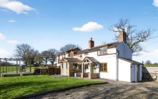 Exterior of detached 1820s house on Ffordd Y Bont near Mold